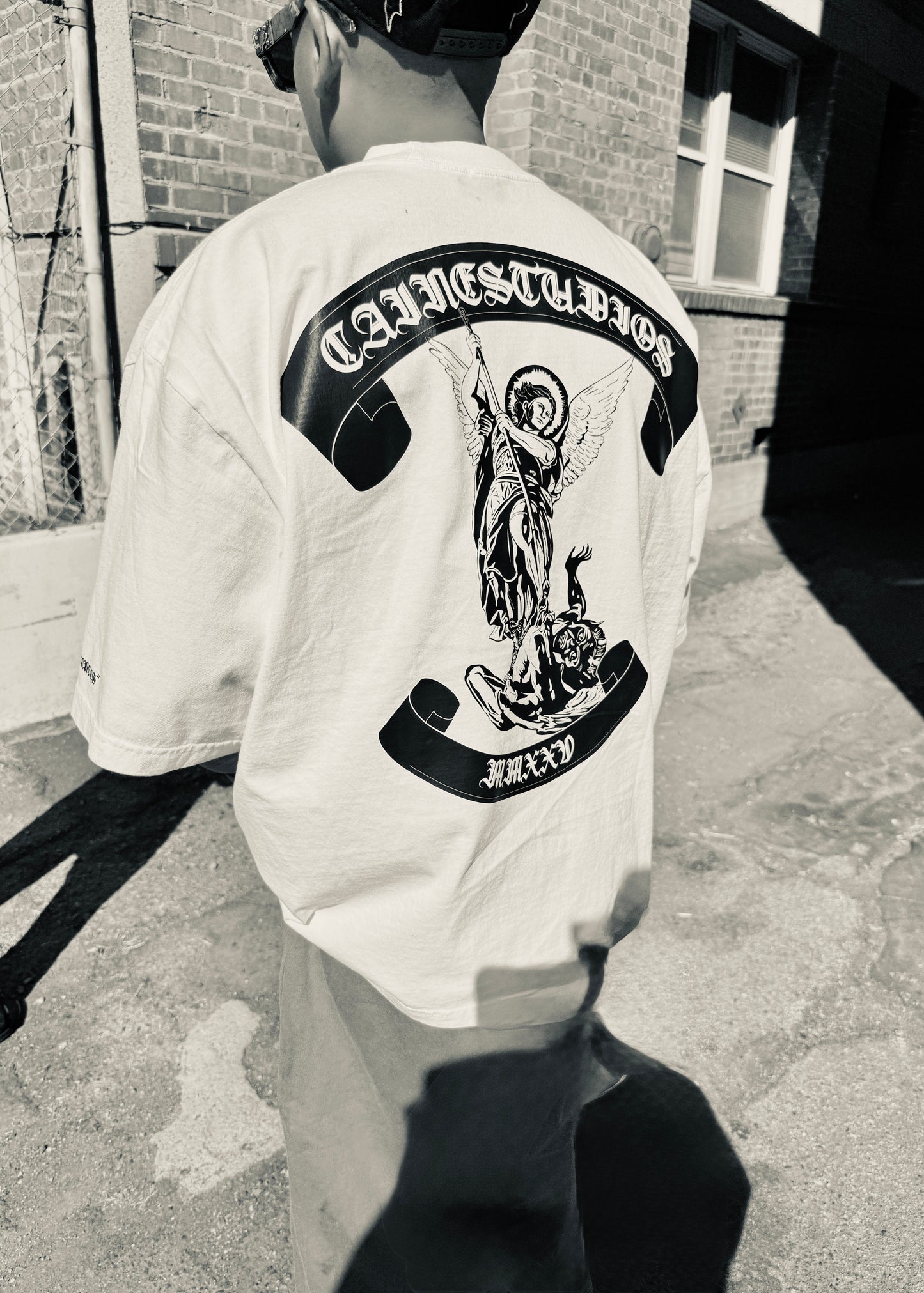 “SAINTS + SINNERS” BOXY TEE